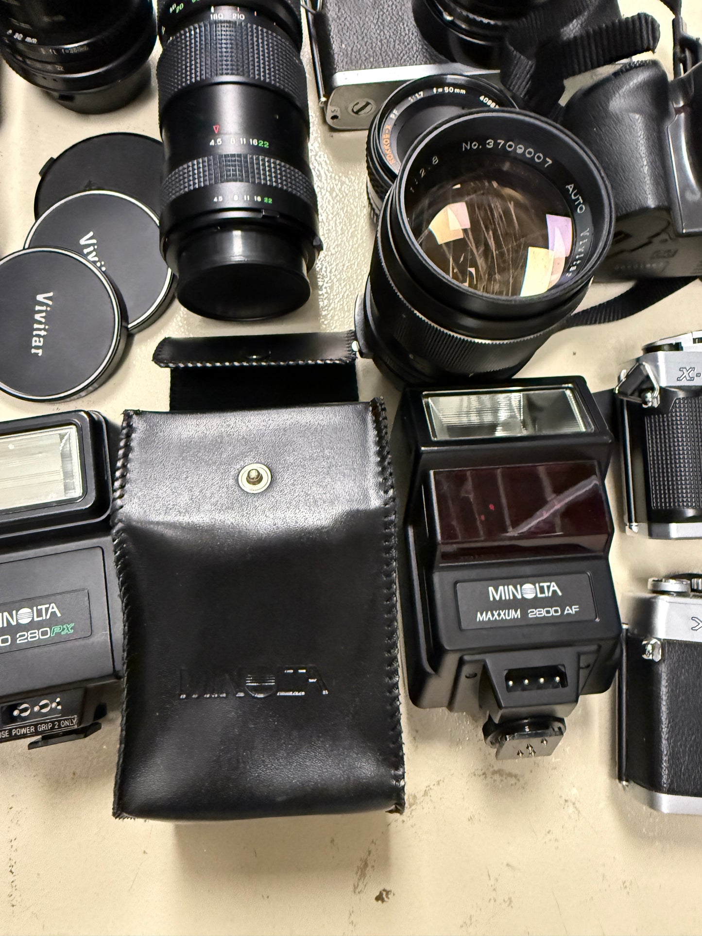 Minolta Film camera MF and AF equipment lot lens, flash
