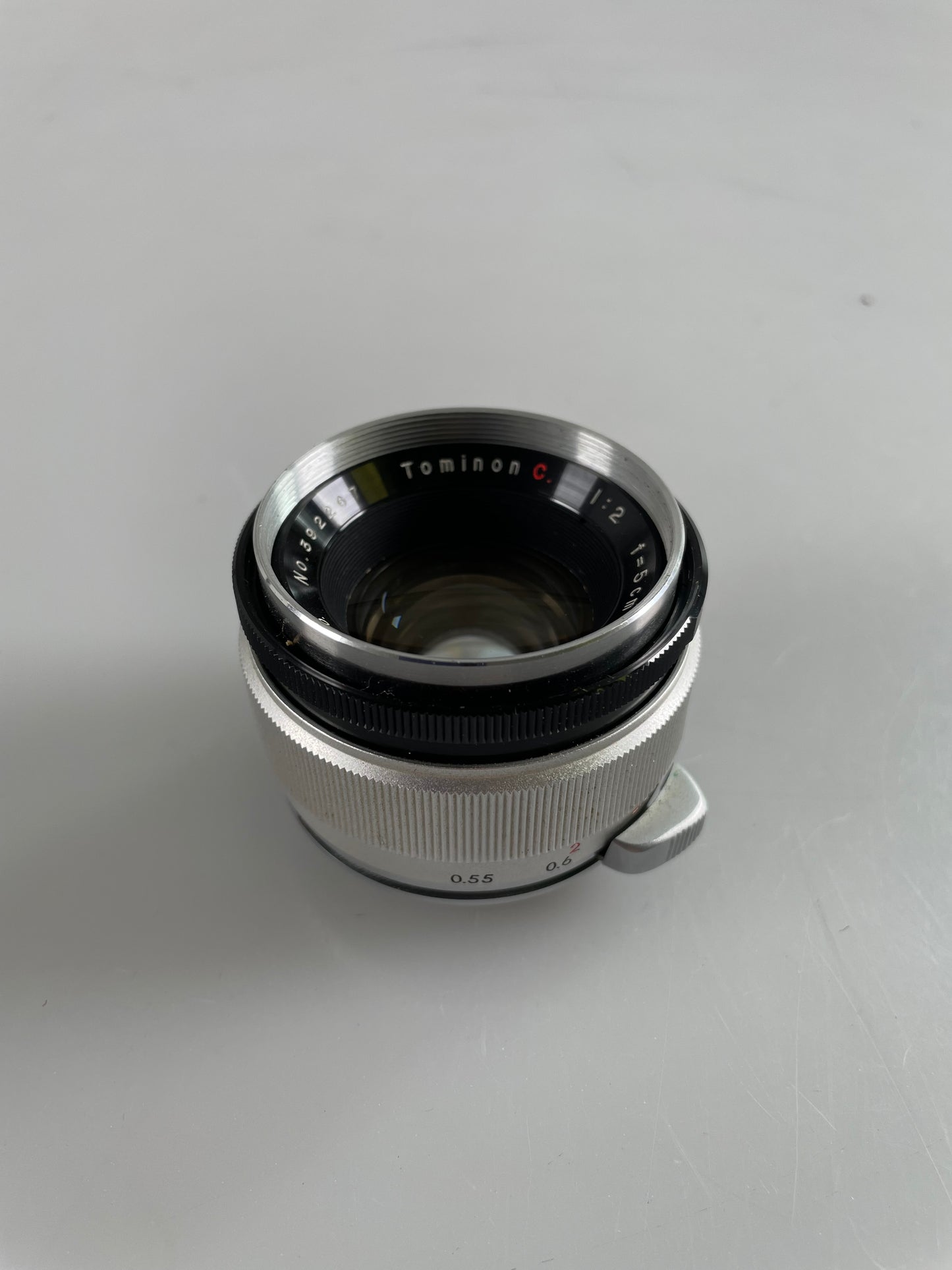 Tominon 5cm 50mm f2 Tomioka M-42 mount lens