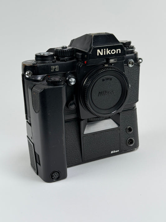Nikon F3 35mm SLR film camera body w/ MD-4 - Heinz Kluetmeier