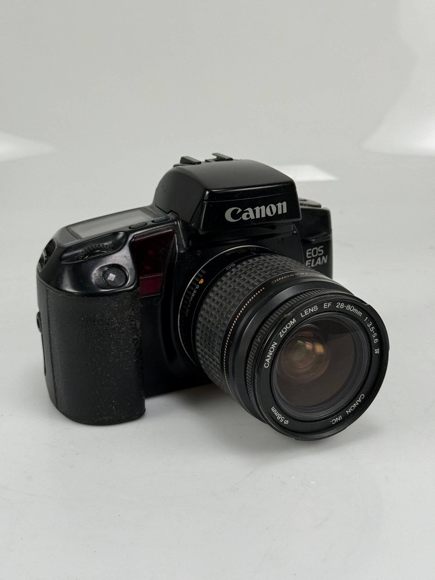 Canon EOS ELAN Film SLR Camera with 28-80mm lens kit