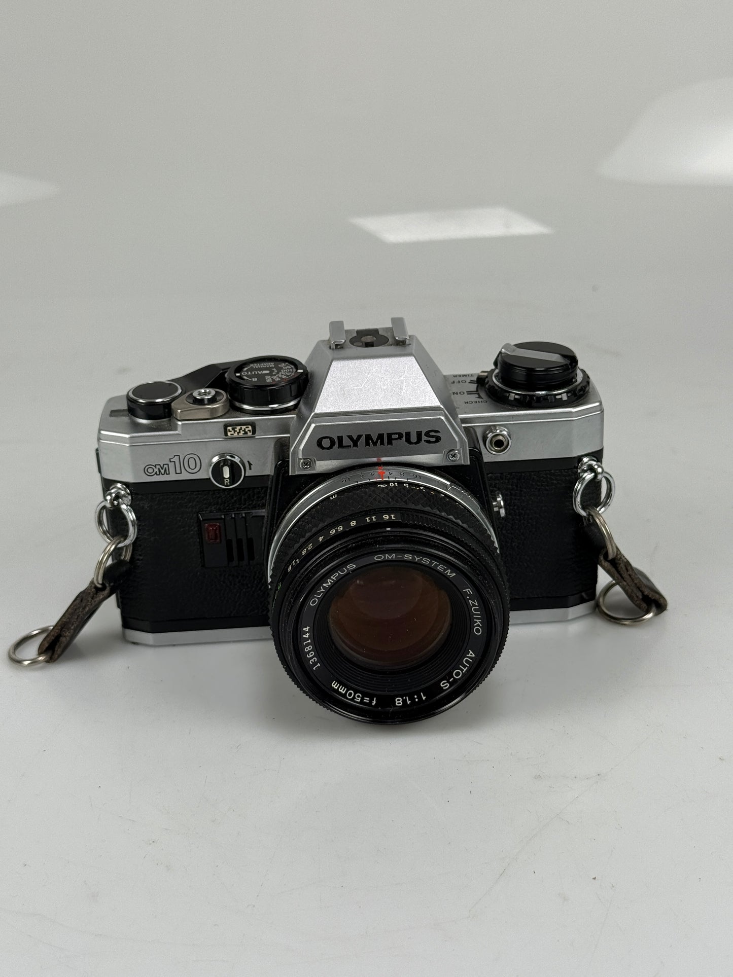 Olympus OM-10 35mm SLR Film Camera with 50mm f1.8 lens kit