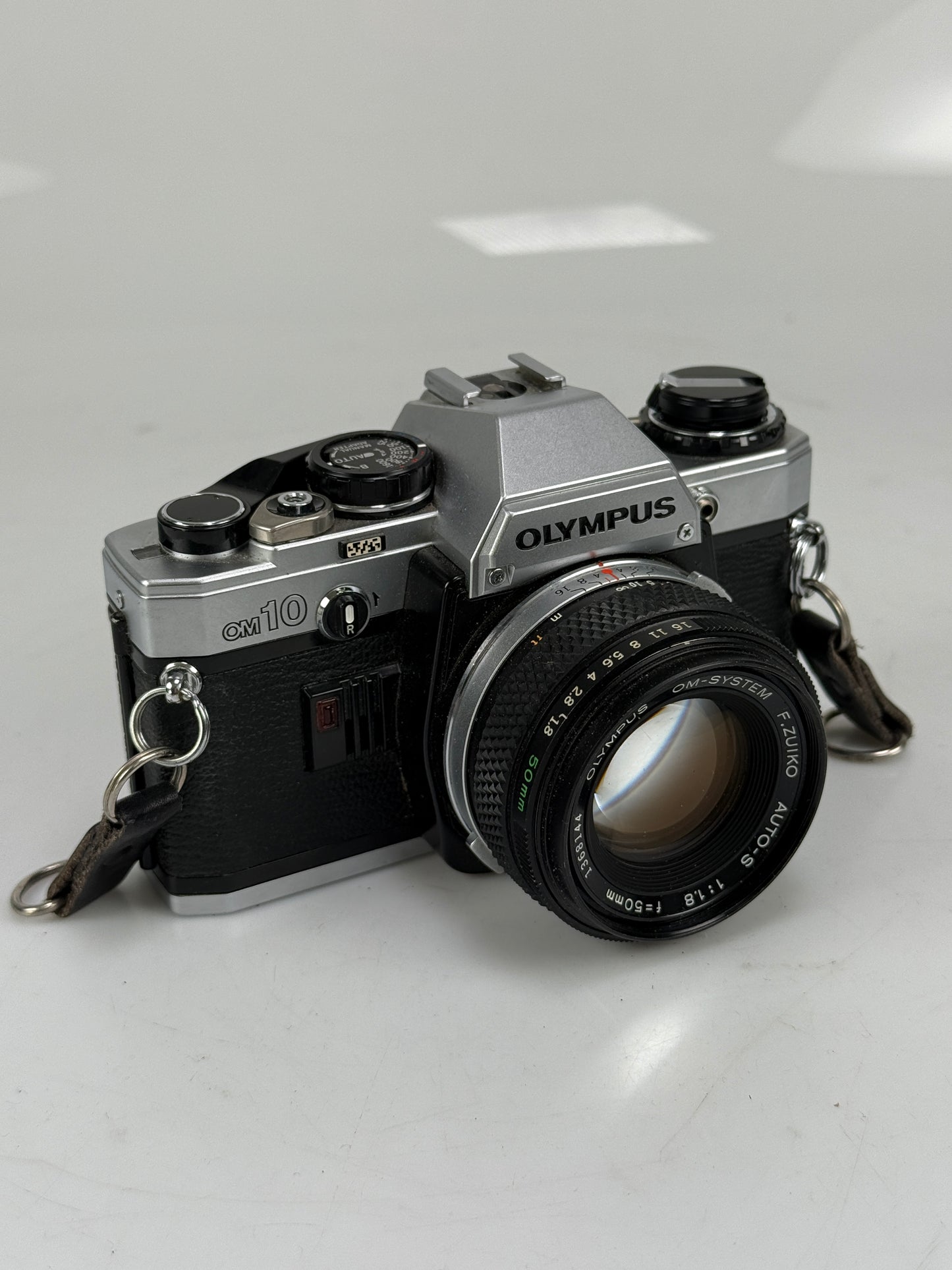 Olympus OM-10 35mm SLR Film Camera with 50mm f1.8 lens kit
