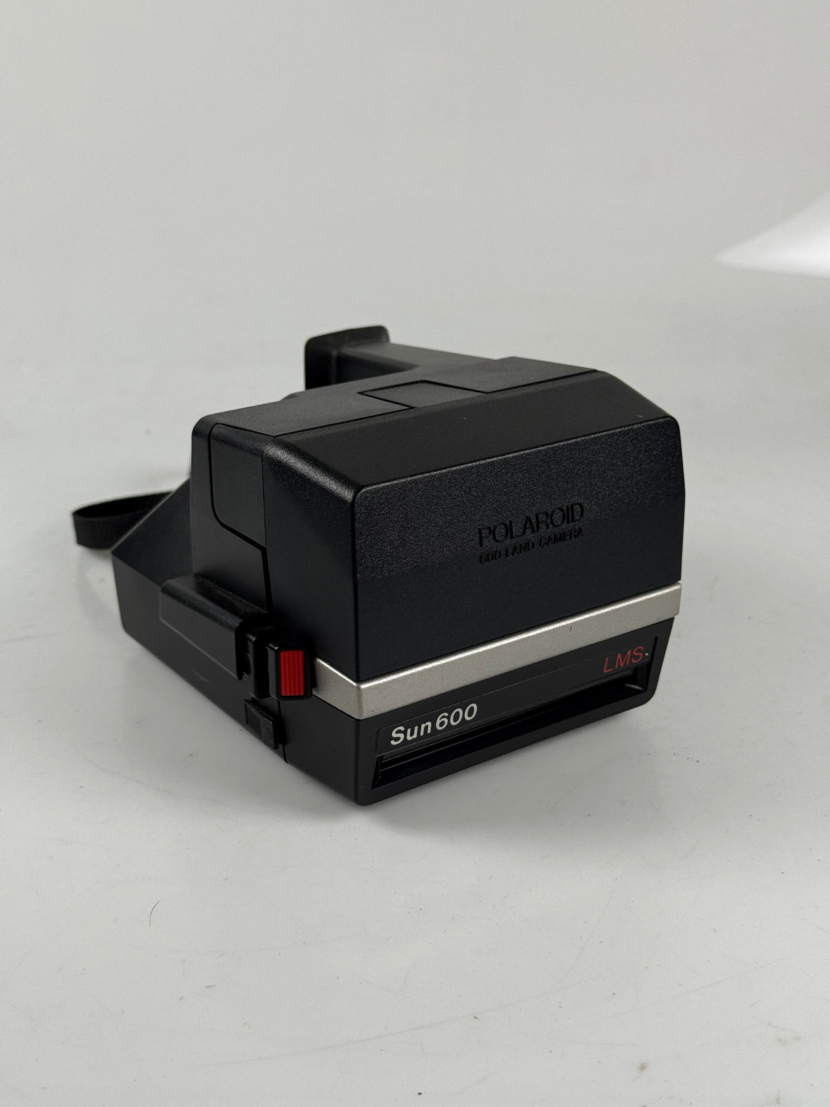 Polaroid Sun 600 AutoFocus Instant Film Camera w/ case