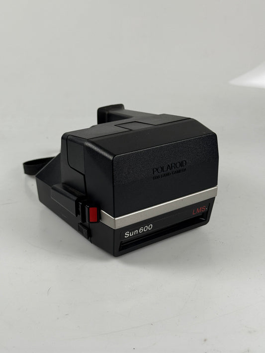 Polaroid Sun 600 AutoFocus Instant Film Camera w/ case