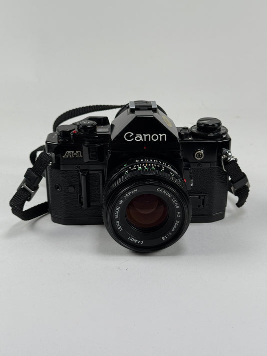 CANON A-1 black SLR 35mm Film Camera with 50mm f1.8 Lens kit