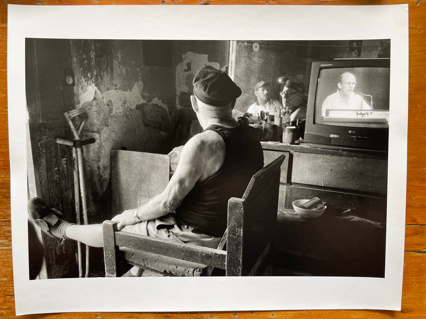 Susan S. Bank (American, 20th c.) Cuba Photograph Print Piercing through the darkness 11x14 “Crippled Man TV Set”