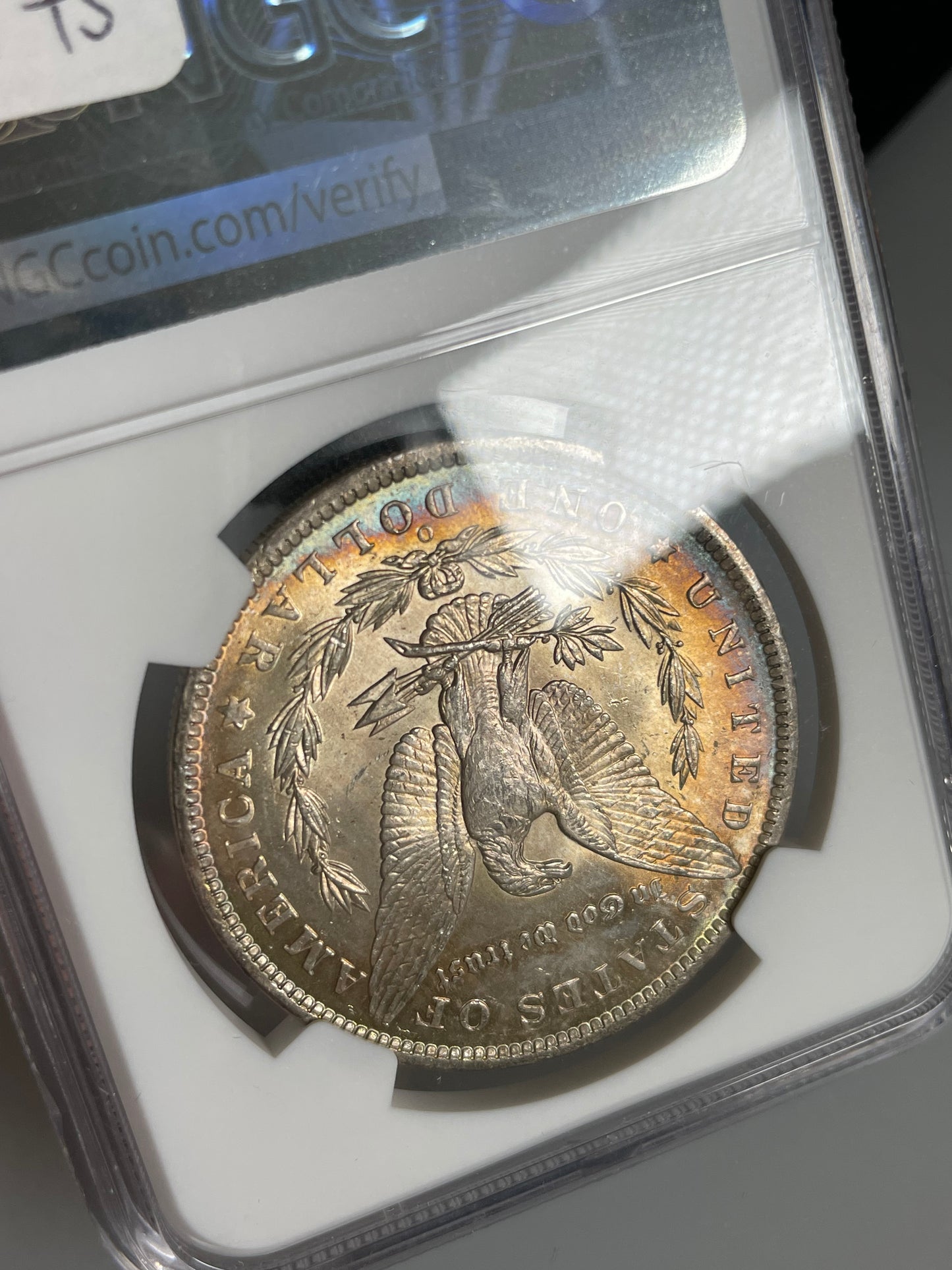 1885-O Morgan Dollar NGC MS65 Rainbow Toned