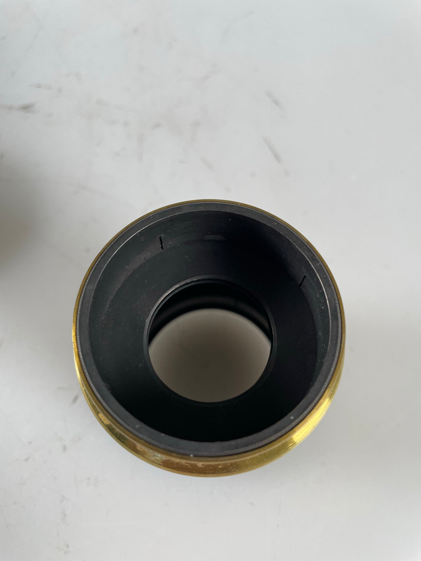 Unmarked Brass Lens with multiple interchangeable optics and waterstops