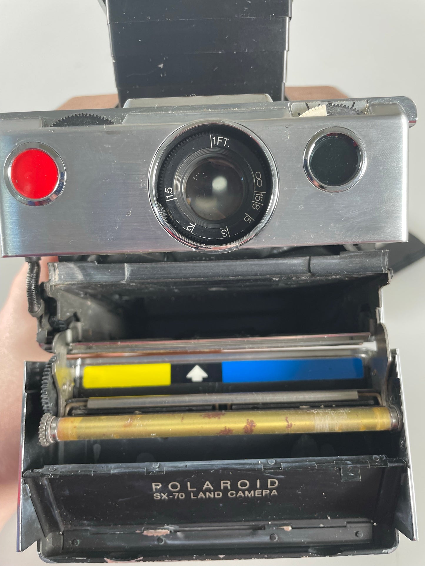Polaroid SX-70 film land camera tan and chrome
