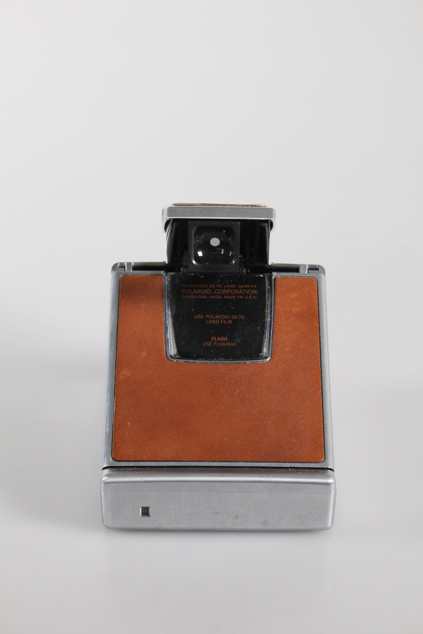 Polaroid SX-70 film land camera tan and chrome kit with case and flash bar
