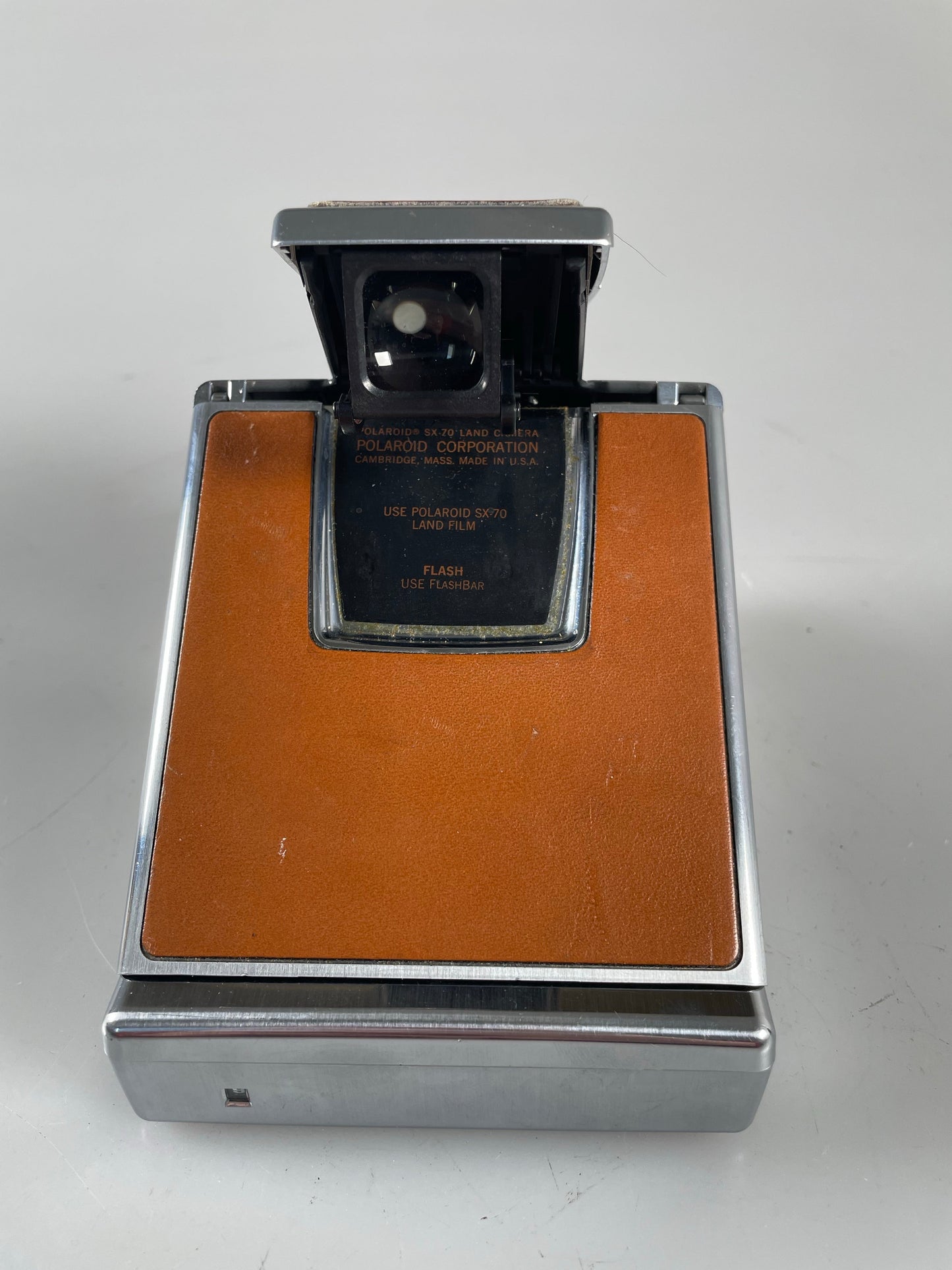 Polaroid SX-70 film land camera tan and chrome